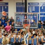 NICOLE SHANNON / MAIN FOCUS MEDIA 
The Elma student section reacts to a slam dunk from Eagles senior Isaac McGaffey during a 52-51 loss to Hoquiam on Thursday in Elma.