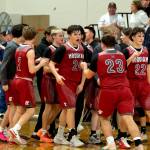 NICOLE SHANNON / MAIN FOCUS MEDIA 
Lincoln Niemi (24) and the Hoquiam Grizzlies celebrate a 52-51 victory over Elma on Thursday at Elma High School.