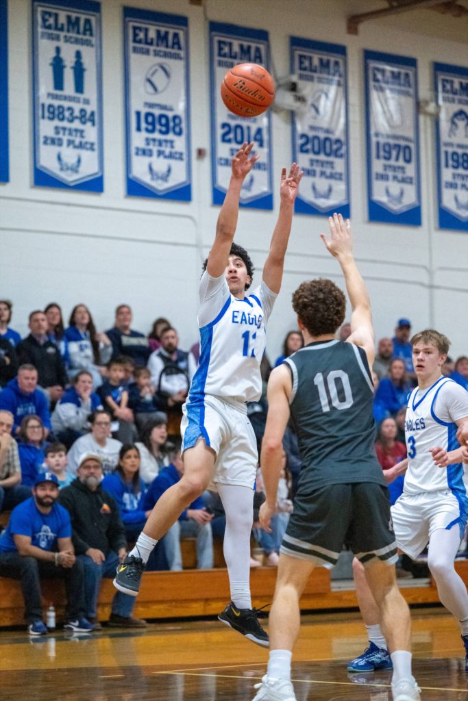 PHOTO BY FOREST WORGUM Elma guard JanCarlos Moreno (12) hits a jump shot during a 60-44 win over Montesano on Wednesday at Elma High School.