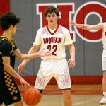 RYAN SPARKS | THE DAILY WORLD Hoquiams K.J. McCoy (22) defends Aberdeen guard Xanto Raya during the Grizzlies 69-60 win on Thursday at Hoquiam Square Garden.