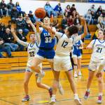PHOTO BY MIKE ROBERTS Elmas Olivia Moore (33) is fouled during a 51-30 win over Rochester in a 1A Evergreen League game on Thursday at Elma High School.