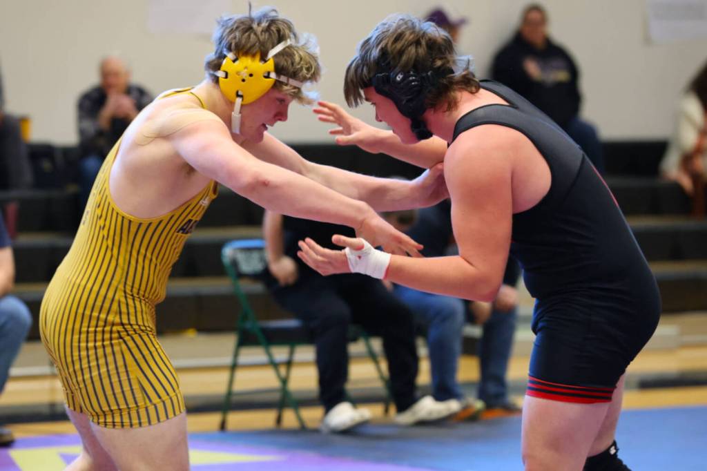 ERICA MCCRORY | MCCRORY PHOTOGRAPHY Aberdeens Jimmie Gertson (left) wrestles during a 215-pound match at the Keigen Langholff Memorial meet on Saturday in Silverdale.
