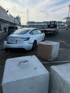 Avalon Towing and Recovery
Avalon Towing and Recovery prepares to transport a suspects vehicle after a police chase ended in a crash.