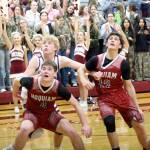RYAN SPARKS | THE DAILY WORLD Montesanos Joey Bozich (4) and K.J. McCoy (22) compete for a rebound with Montesanos Mason Fry during the Bulldogs 71-70 overtime victory on Wednesday at Montesano High School.