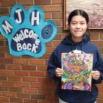 Andrea Watts photos / The Daily World
Eighth grader Camila Fonseca was one of the students who participated in the first annual student silent art auction at Miller Junior High School. Her art piece was inspired by an Aztec mural, and she used acrylic markers on fine art paper to create her artwork.