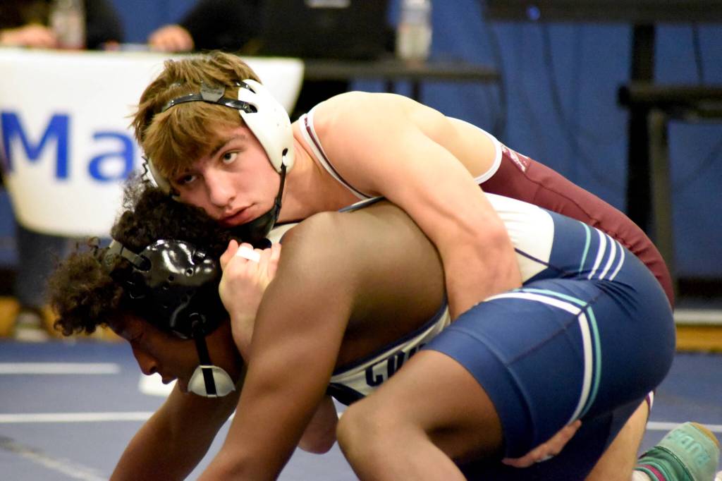 PHOTO BY SUE MICHALAK BUDSBERG Montesanos Gage Stutesman (top) competes in a dual meet against Cascade Christian during the WSWCA 1A Boys State Duals Championships on Saturday in Wapato.