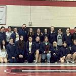 SUBMITTED PHOTO The Aberdeen Bobcats girls wrestling team pose for a photo with their state fifth-place trophy at the inaugural WSWCA Girls State Duals Championships on Saturday at Othello High School.