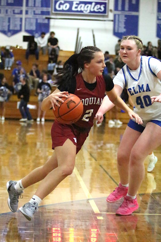 RYAN SPARKS | THE DAILY WORLD Hoquiam guard Lexi LaBounty (2) drives to the hoop against Elmas Killie Vest during the Grizzlies 51-38 win on Tuesday at Elma High School.