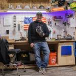 Owen Sexton photos / The Chronicle
KTMK Gloves founder Ken Ervin poses for a photo inside his Aberdeen garage on Thursday, Jan. 29, sporting his custom glove he made for his own personal use.