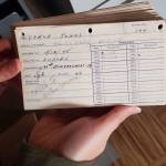 Andrea Watts / The Daily World
Among the records that Holly Pierce, quartermaster/adjutant for Post 5564 and Junior Vice Commander with the Department of Washington Veterans of Foreign Wars found are original membership cards and meeting notes.