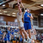 PHOTO BY FOREST WORGUM Elmas Dylan Myer (right) defends against Montesanos Ryan Weidman during the Eagles 54-32 loss on Friday at Montesano High School.