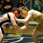 ERICA MCCRORY | MCCRORY PHOTOGRAPHY Aberdeens Jimmie Gertson (right) faces off against Centralias Alika Vargas in the 215-pound title match at the 2A Evergreen Conference Championships on Saturday in Tumwater. Gertson won the match via 6-2 decision.
