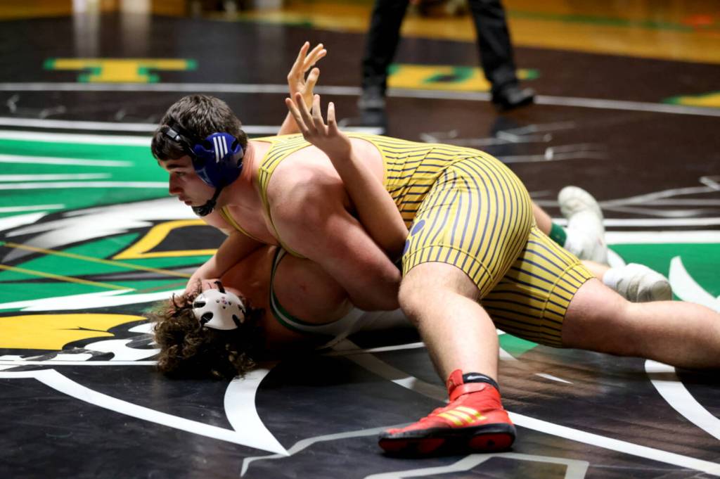 ERICA MCCRORY | MCCRORY PHOTOGRAPHY Aberdeens Landon Hamblin (top) gets a pinfall victory at 0:38 against Tumwaters Finn Bracy to win the 285-pound title at the 2A Evergreen Conference Championships on Saturday in Tumwater.