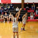 PHOTO BY TIA CHENEY Taholahs Domonique Rodriguez (1) shoots from long range during a 60-56 victory over Pe Ell in a 1B District 4 Tournament game on Wednesday at Taholah High School.