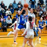 PHOTO BY MIKE ROBERTS Elmas Olivia Moore (33) drives to the basket during a 44-43 loss to Columbia (White Salmon) in a 1A District 4 Tournament first-round game on Friday at Columbia High School.