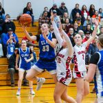 PHOTO BY MIKE ROBERTS Elma senior Olivia Moore (33) drives to the hoop against Columbia (White Salmon)s Claira Camacho during the Eagles 44-43 loss in a 1A District 4 Tournament game on Friday at Columbia High School.