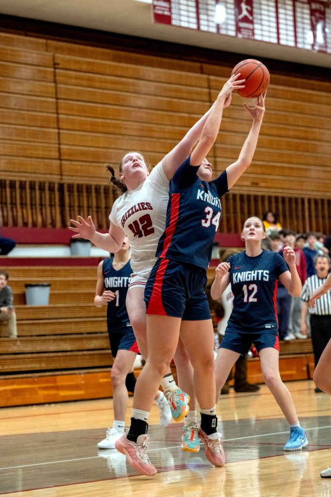 PHOTO BY FOREST WORGUM Hoquiams Sydney Gordon (42) competes for a rebound against Kings Way Christians Addison Bagley during the Grizzlies 35-28 win in a 1A District 4 Tournament game on Friday at Hoquiam High School.