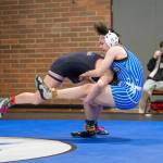 PHOTO BY FOREST WORGUM Hoquiams Emily Brodhead (left) drives into Elmas Felicia MacLean during a 130-pound semifinal match at the WIAA District 4 Girls 1B/2B/1A Tournament on Saturday at Montesano High School.