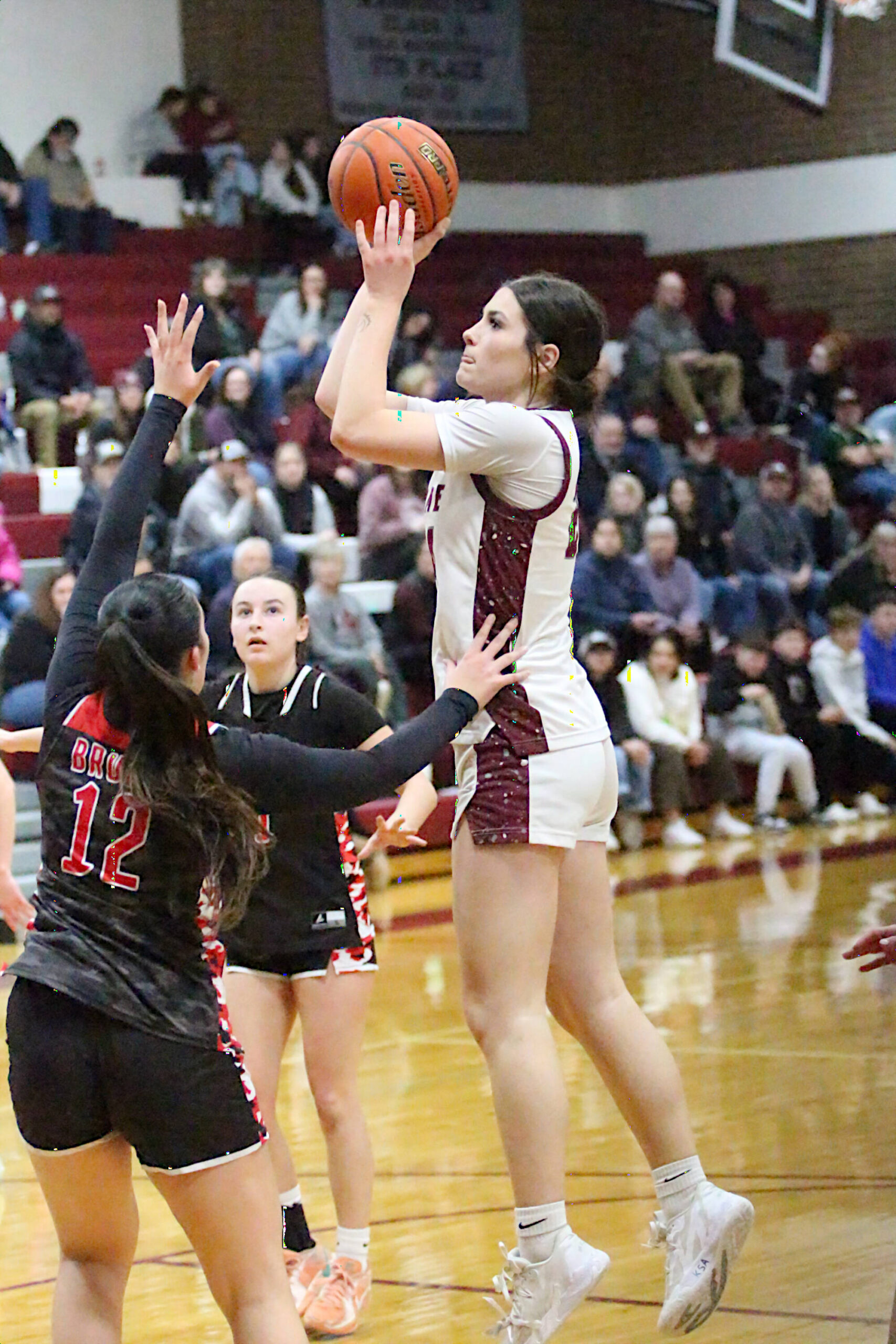 RYAN SPARKS | THE DAILY WORLD Montesano forward Jillie Dalan (right) scores on a jump shot during a 38-27 victory over Columbia (White Salmon) in a 1A District 4 semifinal game on Wednesday in Montesano.