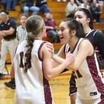 RYAN SPARKS | THE DAILY WORLD Montesanos Makena Blancas (21) celebrates with Ashlyn Lytle after Lytle scored and was fouled during the first quarter of Montesanos 38-27 victory over Columbia (White Salmon) in a 1A District 4 semifinal game on Wednesday in Montesano.