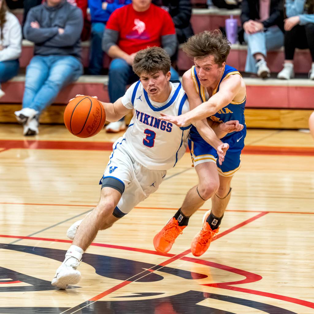 PHOTO BY MATT RUMBLES Willapa Valleys Blane King (3) dribbles up the court against Columbia Adventist guard Carter Krenzler during the Vikings 60-46 win in a 1B District 4 semifinal game on Wednesday in Toledo.