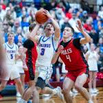 PHOTO BY MATT RUMBLES Willapa Valley guard Blane King (3) is defended by Wakiakums Jayden Stoddard during the Vikings 63-60 loss in the 1B District 4 championship game on Saturday at Montesano High School.
