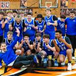 PHOTO BY MIKE ROBERTS 
The Elma Eagles pose for a team photo after securing a berth in the state tournament with a 70-67 win over Hoquiam in a 1A District 4 elimination game on Saturday in Centralia.