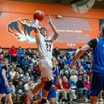 PHOTO BY FOREST WORGUM Hoquiams K.J. McCoy drives to the hoop during a 70-67 loss to Elma in a 1A District 4 elimination game on Saturday at Centralia High School.