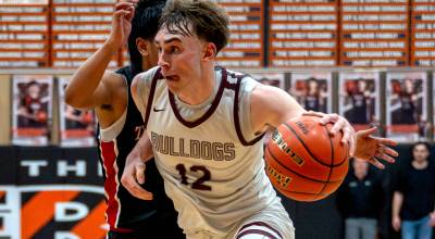 PHOTO BY FOREST WORGUM 
Montesanos Ryan Weidman dribbles through the defense during a 59-55 loss to Fort Vancouver in the 1A District 4 championship game on Saturday at Centralia High School.