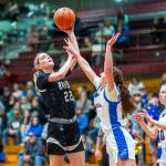 PHOTO BY MATT RUMBLES Raymond-South Bends Ava Baugher (left) shoots during the Ravens 57-34 loss to Adna in the 2B District 4 third-place game on Tuesday at W.F. West High School.