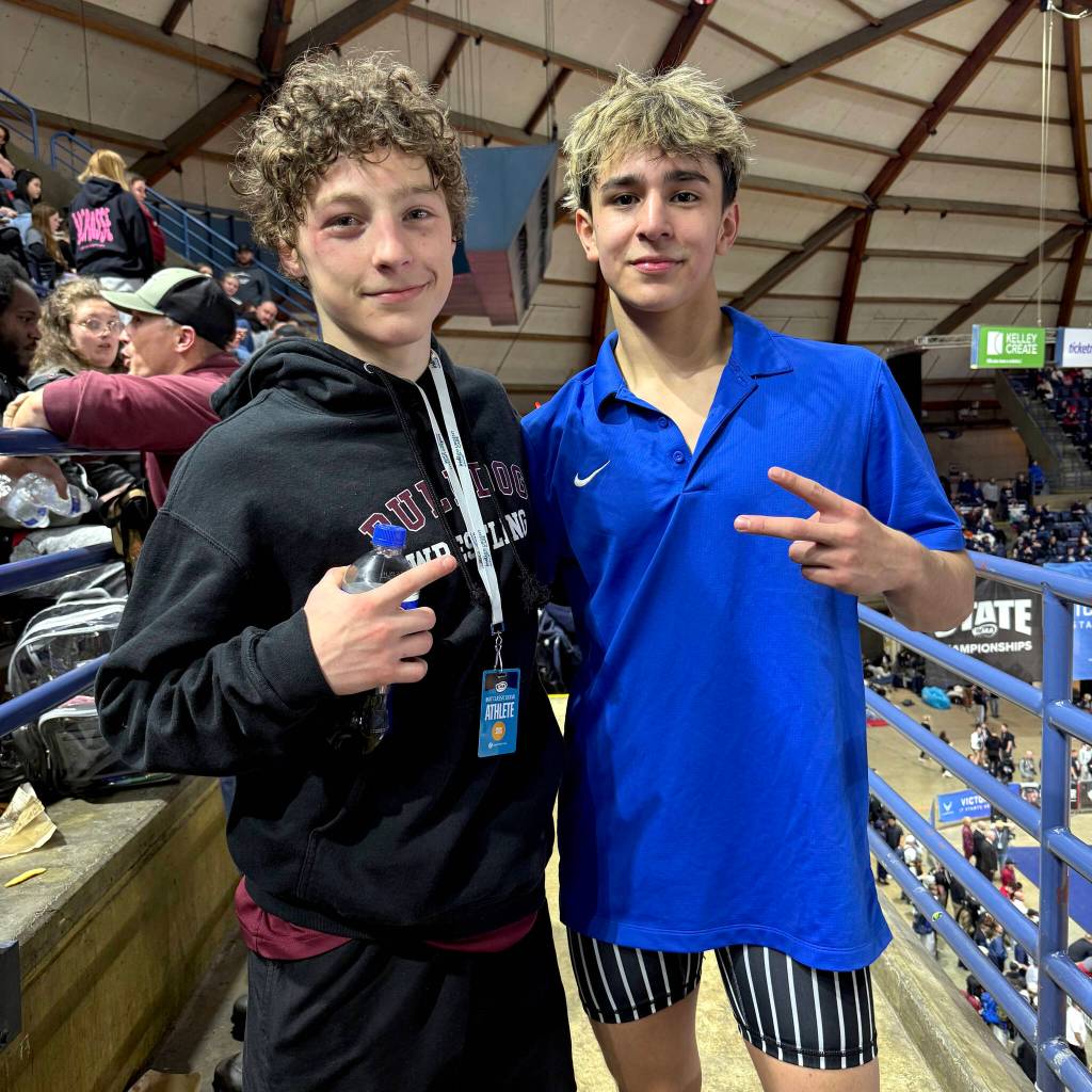 SUBMITTED PHOTO Montesanos Finley Ekerson (left) and Elmas Xavier Espinoza both won state championships at the Mat Classic XXXVII state tournament on Saturday in Tacoma.