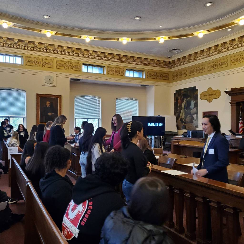 Andrea Watts / The Daily World
The Color of Justice event kicked off with an icebreaker activity that had the students asking each of the six panelists questions related to their work and why they chose a career in law.