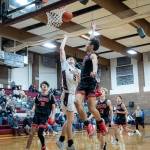 PHOTO BY MATT RUMBLES Raymond-South Bend junior forward Tanner Morris (5)