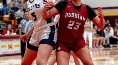 PHOTO BY FOREST WORGUM Hoquiams Aaliyah Kennedy (23) and Cascade Christians Abigail Shelton compete for a rebound during the Grizzlies 47-37 loss in a 1A State Tournament opening-round game on Friday at Mount Tahoma High School in Tacoma.