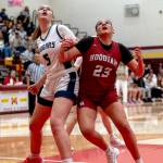 PHOTO BY FOREST WORGUM 
Hoquiams Aaliyah Kennedy (23) and Cascade Christians Abigail Shelton compete for a rebound during the Grizzlies 47-37 loss in a 1A State Tournament opening-round game on Friday at Mount Tahoma High School in Tacoma.