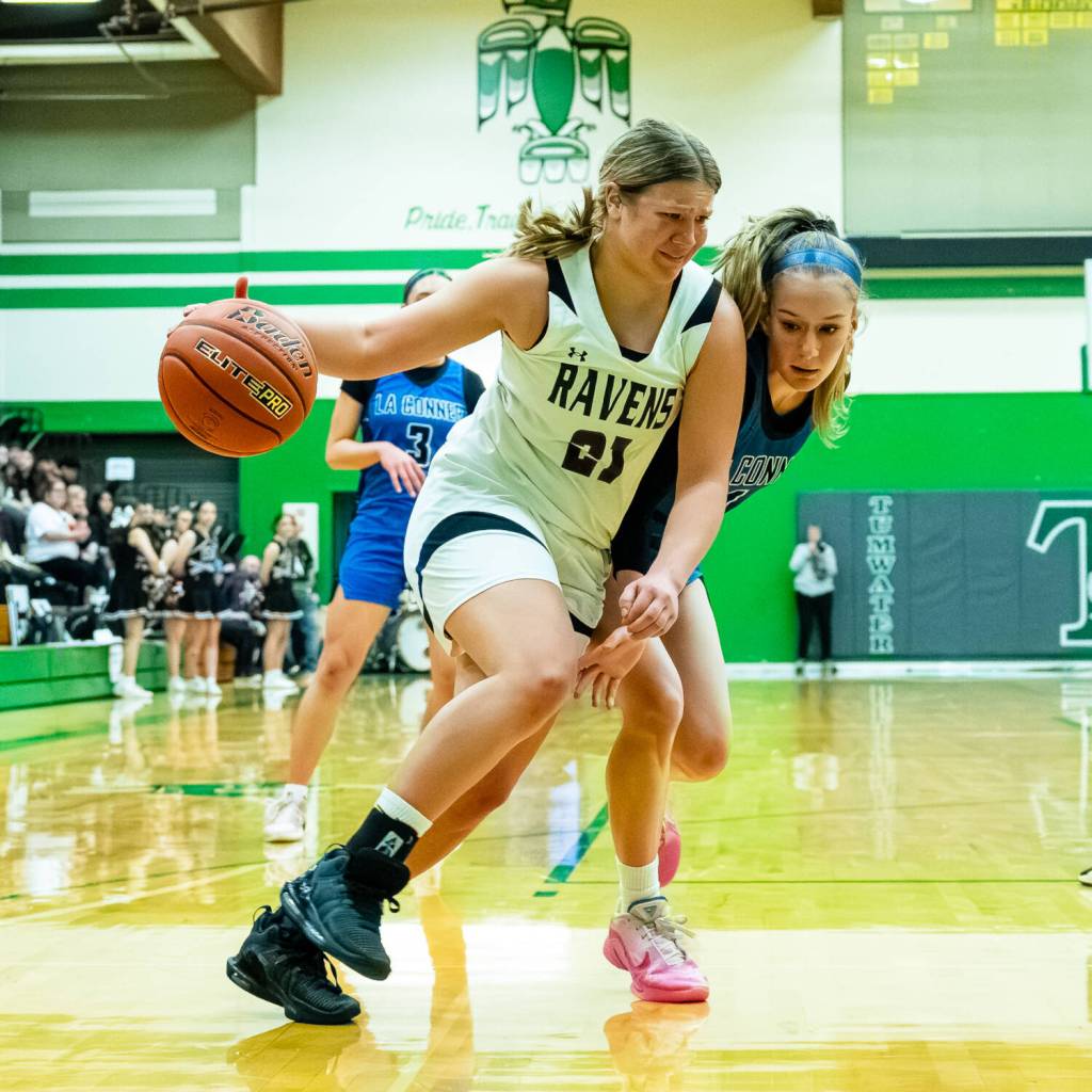 PHOTO BY MATT RUMBLES 
Raymond-South Bends Kassie Koski (21) drives to the rim during a 50-40 win over La Conner in a 2B State Tournament first-round game on Saturday at Tumwater High School.