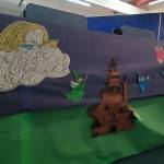 The student cast created and signed a mural that audience members passed by as they entered the gym.