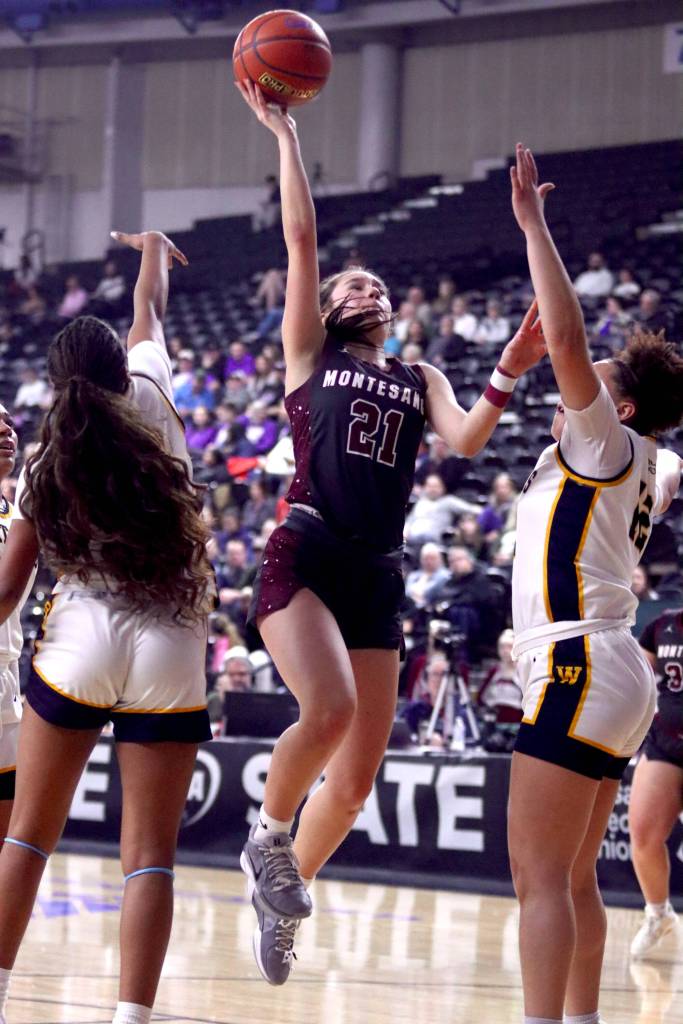 PHOTO BY HAILEY BLANCAS Montesanos Makena Blancas (21) puts up a shot during a 47-33 loss to Annie Wright in a 1A State Tournament Round of 12 game on Wednesday at the SunDome in Yakima.