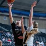 PHOTO BY FOREST WORGUM Montesano senior forward Jillie Dalan (24) scores while defended by Annie Wrights Katya Defebaugh during a 47-33 loss in a 1A State Tournament Round of 12 game on Wednesday at the SunDome in Yakima.