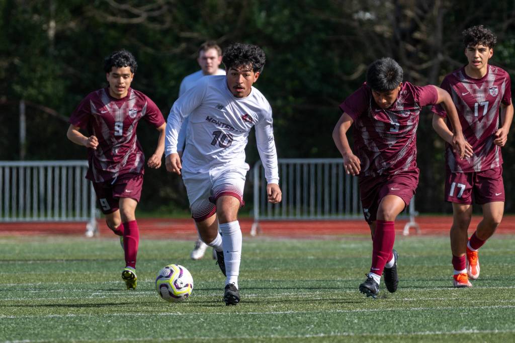 PHOTO BY FOREST WORGUM Montesanos Cris Tobar (10) sprints away from Wahluke players during a 7-3 loss on Saturday at Jack Rottle Field in Montesano.