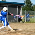 CHRYSTAL WELD PHOTOGRAPHY Elmas Ashlynn Weld rips a double during a 14-0 win over Rochester on Monday at Rochester High School.