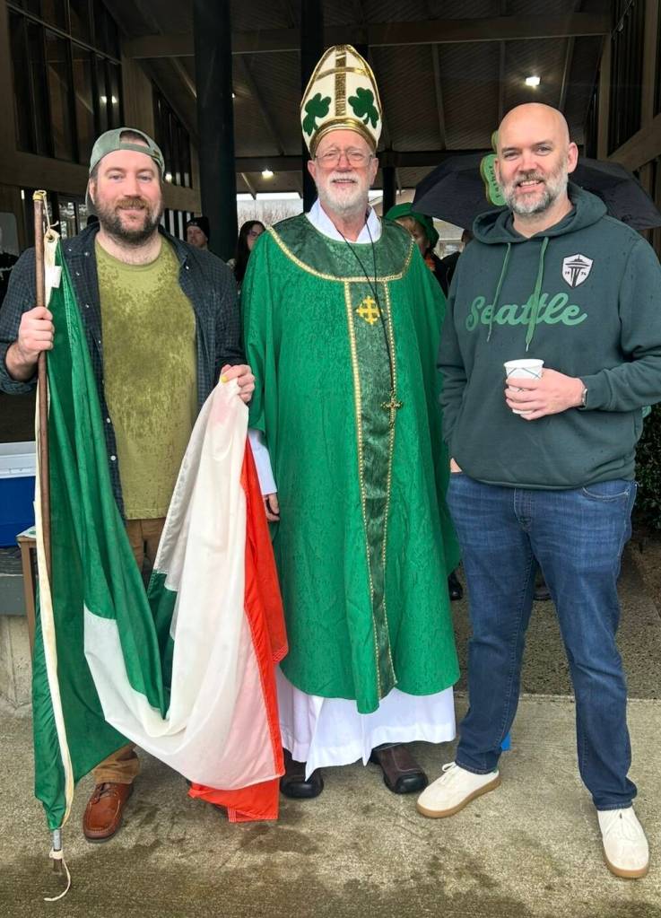 The Daily World
From left: Drew Granneman from Hoquiam Brewing, Bill Gibbons, owner of 8th St. Ale House, and Patrick Durney pose in front of Durney Insurance during the 2026 St. Patricks Day Parade.