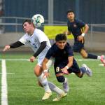 RYAN SPARKS | THE DAILY WORLD 
Aberdeens Gibran Garcia (8) collides with Kelsos Rowan Keith during the Bobcats 3-1 victory on Wednesday at Stewart Field in Aberdeen.