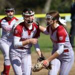 RYAN SPARKS / THE DAILY WORLD Hoquiam shortstop Lexi LaBounty (left) is congratulated by pitcher Hailee Burgess during an 11-0 loss to Aberdeen on Saturday in Hoquiam.
