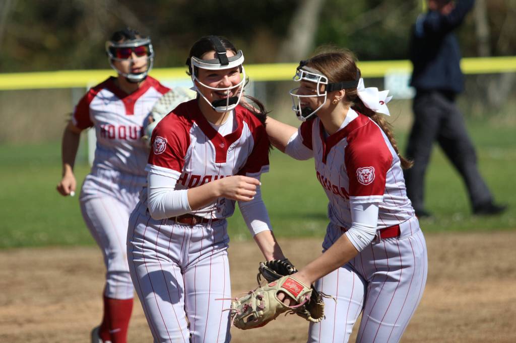 RYAN SPARKS / THE DAILY WORLD Hoquiam shortstop Lexi LaBounty (left) is congratulated by pitcher Hailee Burgess during an 11-0 loss to Aberdeen on Saturday in Hoquiam.