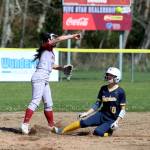 RYAN SPARKS / THE DAILY WORLD Hoquiam second baseman Aldeen Olvera-Obi (left) attempts to turn a double play during an 11-0 loss to Aberdeen on Saturday in Hoquiam.