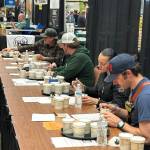 Jerry Knaak / The Daily World
The judges hunker down for the clam chowder tasting contest.