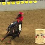 Gabriella Hernandez negotiates the last turn on her way to winning the barrel races with a time of 15.0 seconds at the Grays Harbor Mounted Posse Indoor Rodeo Sunday.