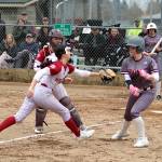 RYAN SPARKS | THE DAILY WORLD Hoquiam shortstop Lexi LaBounty (left) tags out Montesanos Addi Williamsen during the Grizzlies 16-0 loss on Monday in Hoquiam.