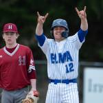 NICOLE SHANNON | MAIN FOCUS MEDIA Elmas Levi Russell (12) celebrates during a victory in a doubleheader against Hoquiam on Monday in Elma.